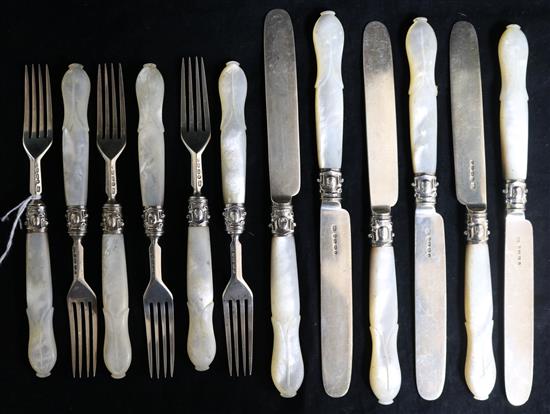 A set of six pairs of Victorian mother of pearl handled silver dessert eaters by John Gammage, Birmingham, 1862.